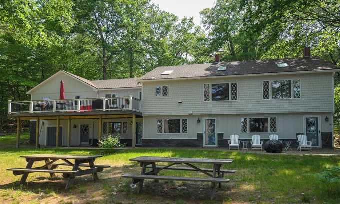 Oxford House | Thompson Lake Retreat with Dock, Spacious Yard, and Game Room!