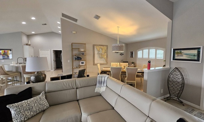 Edgewater House | Tiki Hut on Canal w/Gulf Access, Heated Pool Lanai 12 min. to PGD Airport