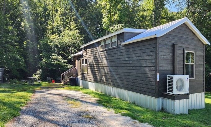 Mill Spring House | Tiny home on the creek, screened in porch, full kitchen, private firepit, sleeps 8