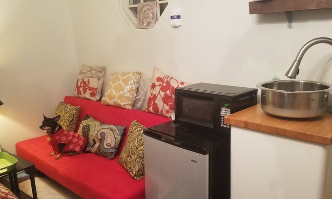 Atlanta House | Tinyhouse, Enchanted Cottage nestled in the backyard of the fenced in property.