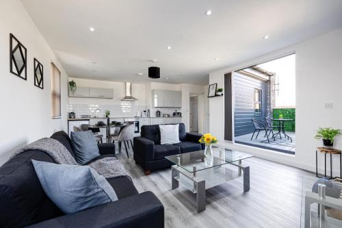 Offerton Apartment | Top Floor Apartment with Private Balcony in Stockport Centre by HASS HAUS