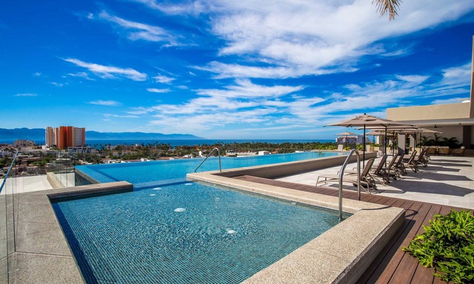 Diaz Ordaz Condo | Top Floor Skyline 2BR in Versalles