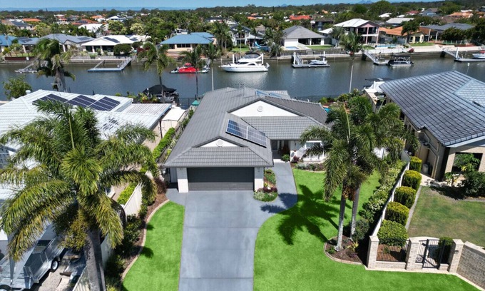 Banksia Beach Apartment | Topsail Tides Waterfront with Solar-Heated Pool and Canal Views