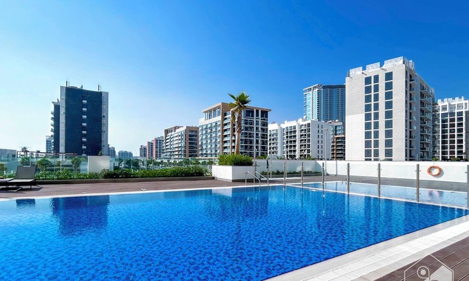 Nad Al Sheba Apartment | Tranquil 1BR Escape With Pool View in Meydan