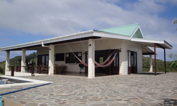 Belmont House | Tranquil 3-bedroom house in Bequia, SVG with AC, WiFi. Enjoy a peaceful getaway