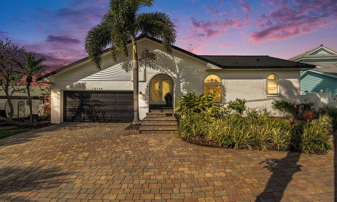 Capri Isle House | TREASURE ISLAND FLORIDA- Discover your luxury 4 bedroom home on canal fishing