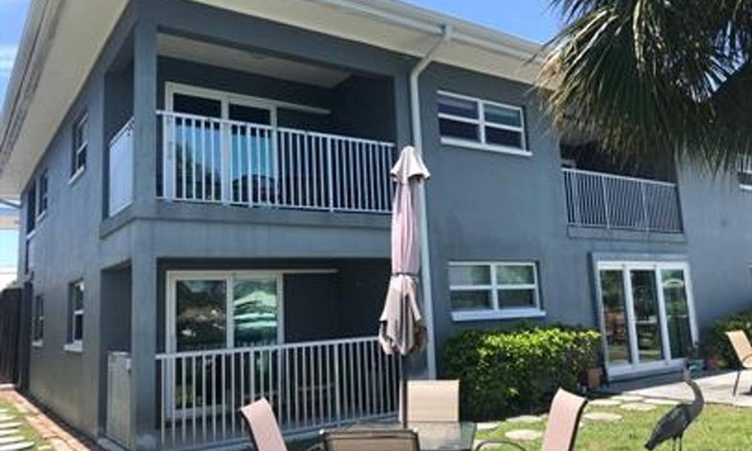 Capri Isle Apartment | Treasure Island Waterfront Oasis Minutes to Beach Dock Sunsets at John’s Pass