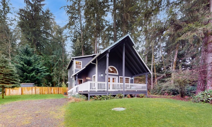 Anderson Island House | Tree-lined Anderson Island home with porch & fenced yard, near dock/tennis