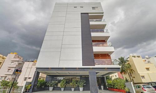 Bengaluru Hotel | Treebo Premium Raj Vista Global Village