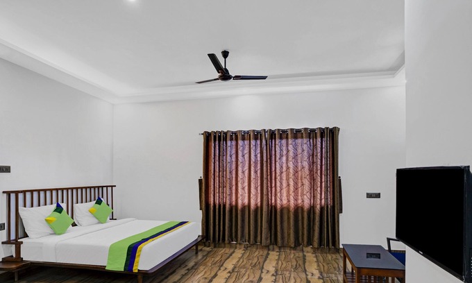 Devikolam Hotel | Treebo Trend The Hazeberg Munnar With Mountain View