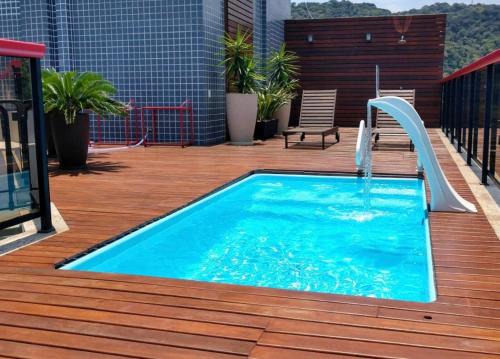 Jardim Ana Maria Apartment | Triplex Guarujá
