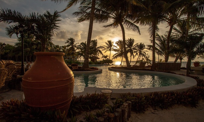San Pedro Condo | Tropical island paradise! Luxury 2 bd 2 bath condo on beach with stunning pool
