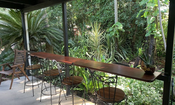 Nome House | TROPICAL RETREAT- relax and unwind surrounded by tropical gardens with huge pool