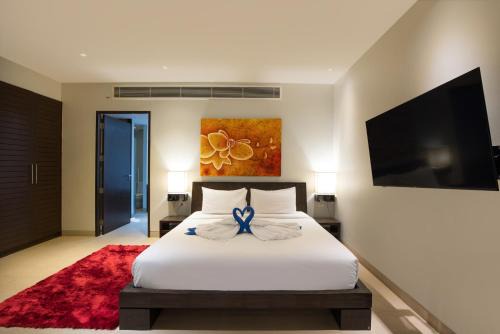 Ban Saiyuan Apartment | Tropical Serenity - Elegant 1 Bedroom with Pool