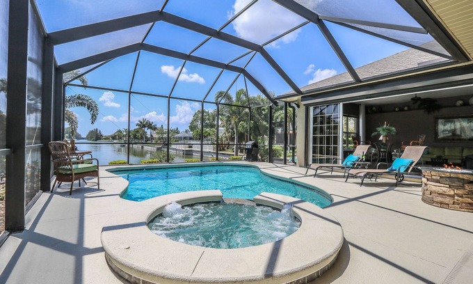 Cape Coral House | Tropical Waterfront Paradise with Amazing Sunset Views!