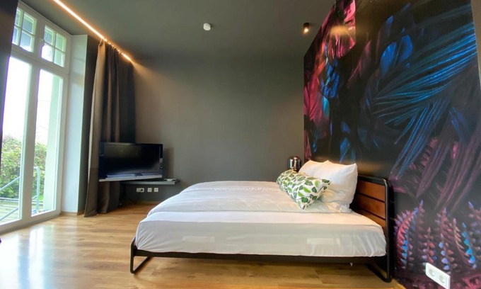 Magdeburg Apartment | Tropisches Loft mit privatem Garten