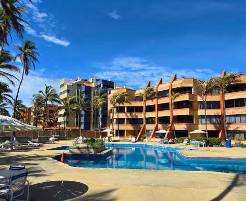 Tucacas Apartment | Tucacas, Frente al Mar, Balcon, Piscina y Playa Privada