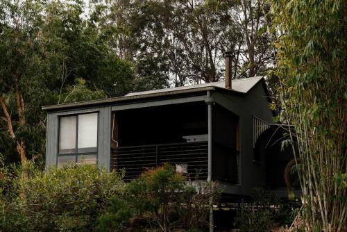 Rathdowney House | Tuckeroo Cottages - Kookaburra Cottage