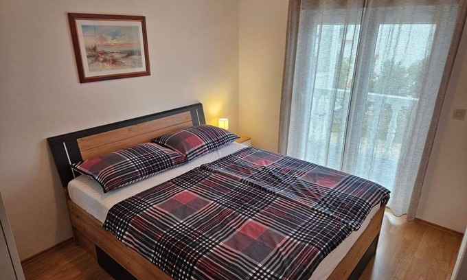 Barbat na Rabu Apartment | Two bedroom apartment with balcony and sea view Barbat, Rab (A-4951-c)