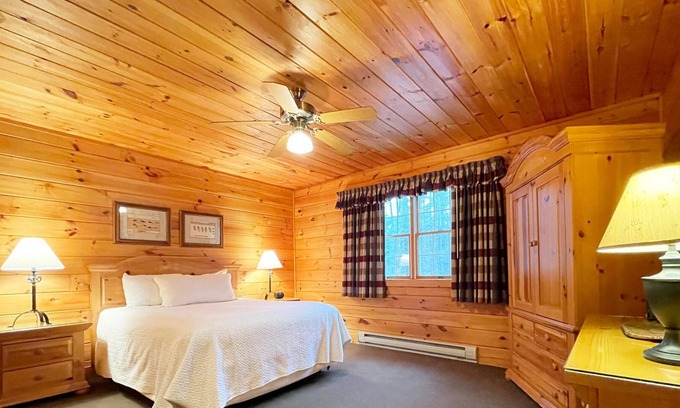 Reeders Cabin | Two-bedroom, two-bath log cabin boasts an incredible lake view