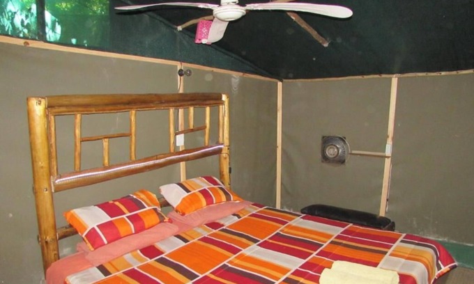Thorny Bush Game Reserve Cabin | Two Bedroomed Bush-tent on the Klaserie River, with free lion / hyena sounds.