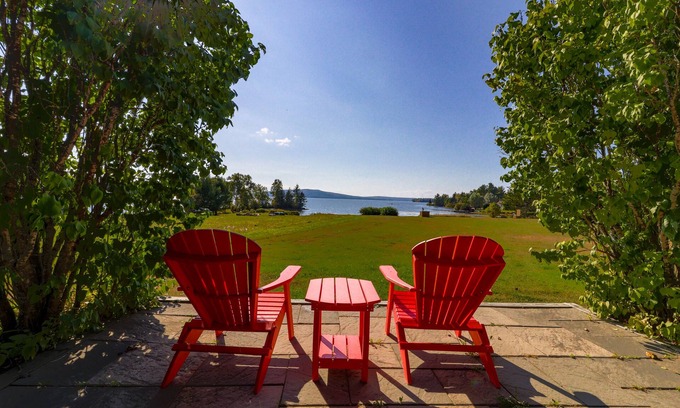 Greenville House | Two lakefront dog-friendly cabins on four acres with porches, dock, & lake views