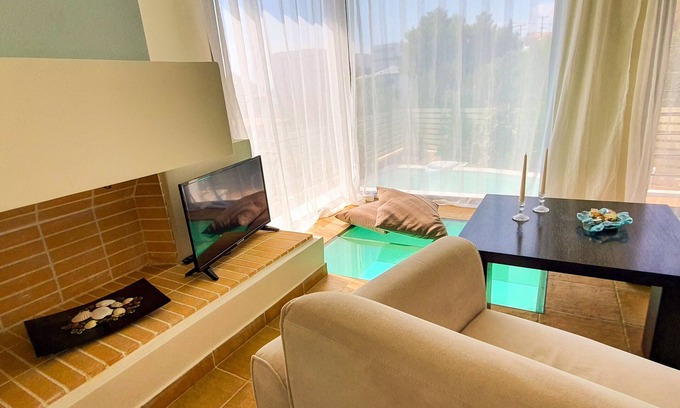 Porto Heli Apartment | Unique 2 bedroom apartment with garden and pool