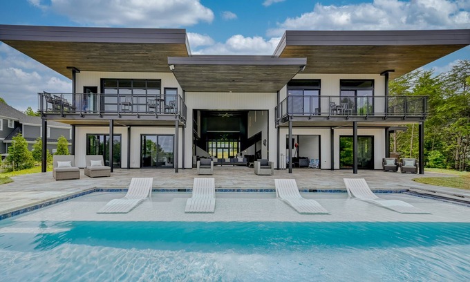 Bumpass House | Unique lake house with infinity pool, hot tub, modern interior, & views