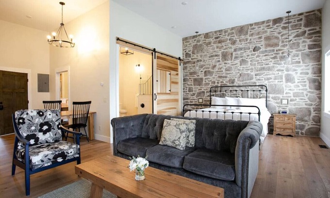 Millersburg Apartment | Unique Rustic Suite with Jacuzzi Tub, Kitchen, Fireplace, and Living Room