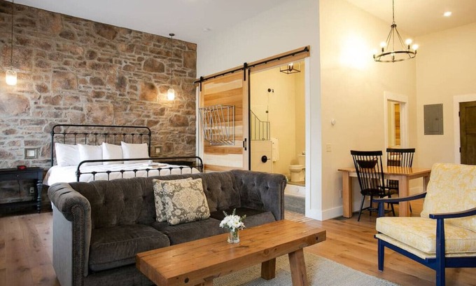 Millersburg Apartment | Unique Rustic Suite with Jacuzzi Tub, Kitchen, Fireplace, and Living Room