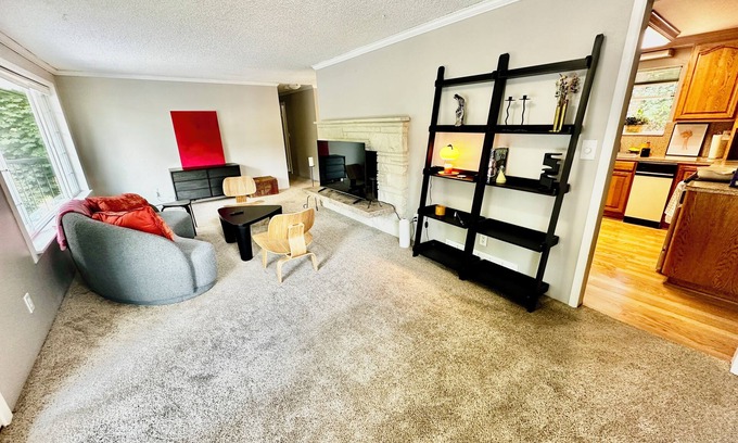 Federal Way House | Unit surrounded by treesnWasher and Dryer + Pet friendly!