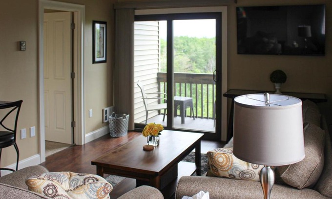 Weirs Beach Apartment | Unwind at The Village