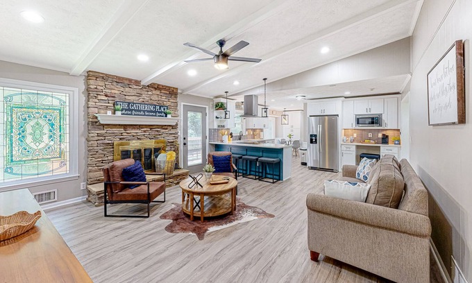 Lilburn House | Updated home with movie room, bar, entertainment space, Ping-Pong, & 2 kitchens
