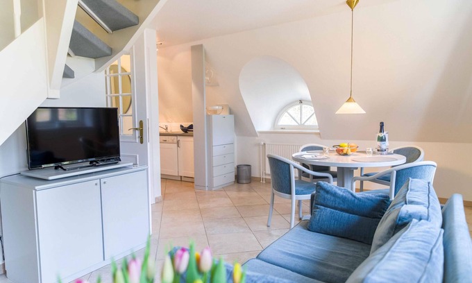 Norddorf Apartment | Upper floor apartment on 2 levels, up to 4 persons, with beach chair in the garden