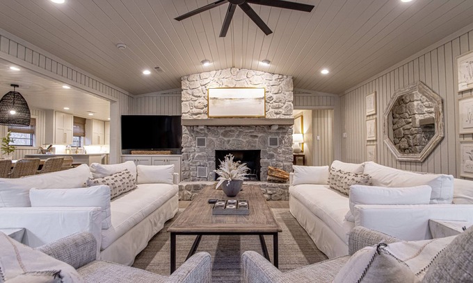 Mid America House | Upscale Lake Retreat on Large Private Lot, Expansive Deck, Boat Dock & Hot Tub!