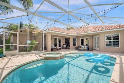 Buena Ventura Lakes House | Upstay - Waterside Home with Pool and Hot Tub