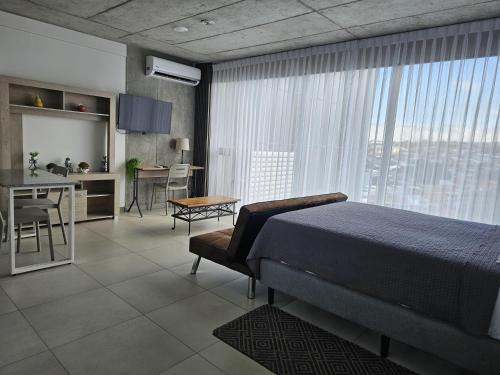 Curridabat Apartment | Urban Breeze iFreses, 10th floor! AC, TV and Pool