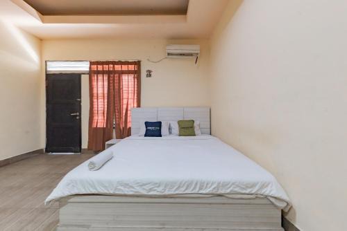 Balikpapan Hotel | Urbanview Hotel Garuda Sky Inn Balikpapan by RedDoorz