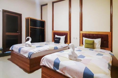 Palembang Hotel | Urbanview Remington Hotel Palembang By RedDoorz