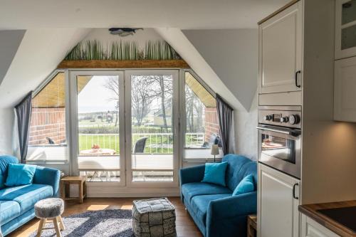 Kronsgaard Apartment | Urlaub mit Ostseeblick, Schwimmbad, Sauna & direkte Strandlage