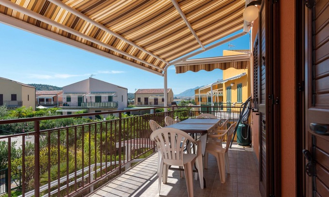 Campofelice di Roccella House | Vacation Home "Oceania" with Sea View, 2 Balconies & Shared Pool
