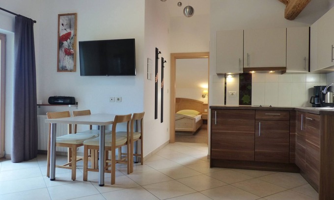 Caines Apartment | Vacation apartment with large panoramic balcony and organic natural bathing pond