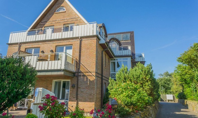 Wenningstedt-Braderup Apartment | Vacation apartment by the village pond for up to 2 people with balcony.