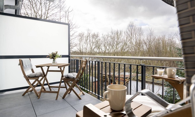 Neustadt in Holstein Apartment | Vacation apartment Kleine Perle in house Pier 67 with balcony in Neustadt