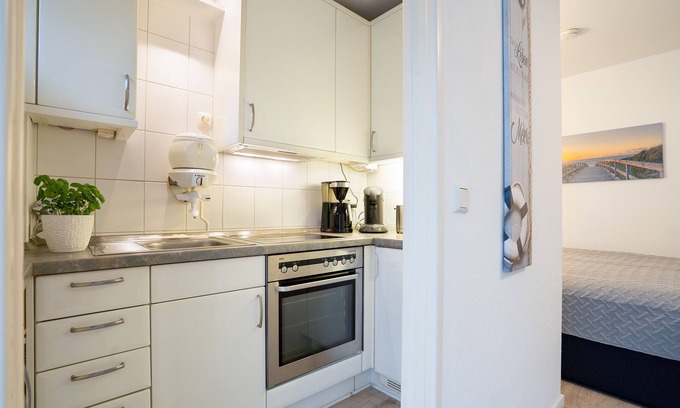 Lutt Kiepenbarg Apartment | Vacation apartment Lüttje Doens in the apartment complex Wennseestraße