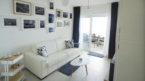 Bregi Apartment | Val Apartment - Four Seasons Escape with sea view and swimming pool