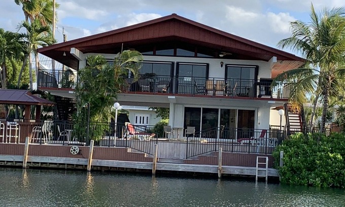 Venetian Shores House | Venetian Shores Escape! Heated Pool, 3BR, 70ft Dock, Dog-Friendly!