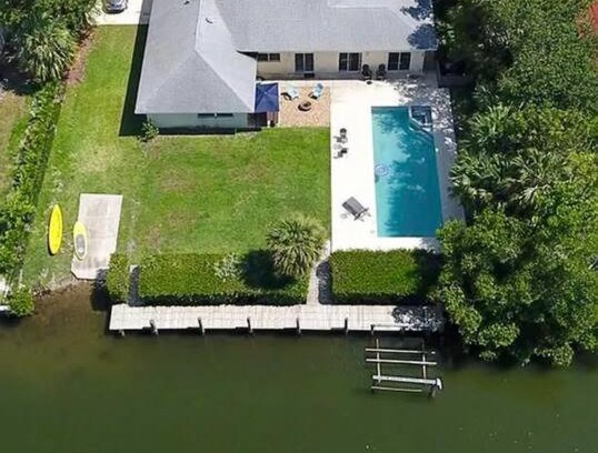 Vero Beach House | Vero Beach Island private gated scantuary with pool, 60' boat dock & kayak launch!