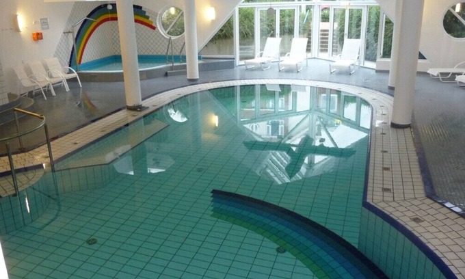 Dorumer Neufeld Apartment | Very cozy comfort vacation apartment with a pool, sauna and sea view