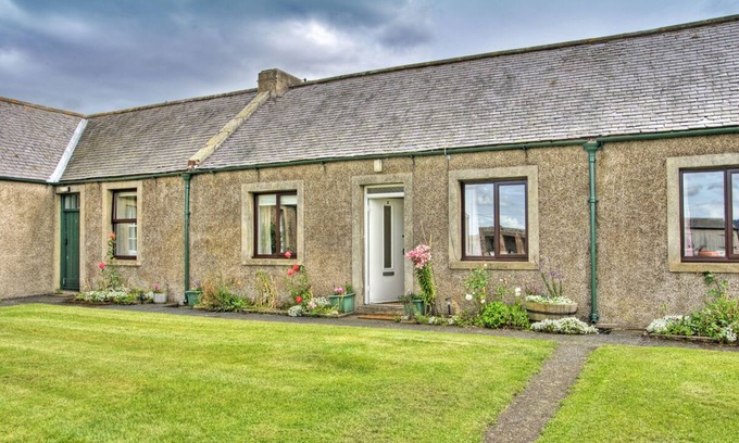 Belford Cottage | Very spacious living area & large secure garden, dog friendly